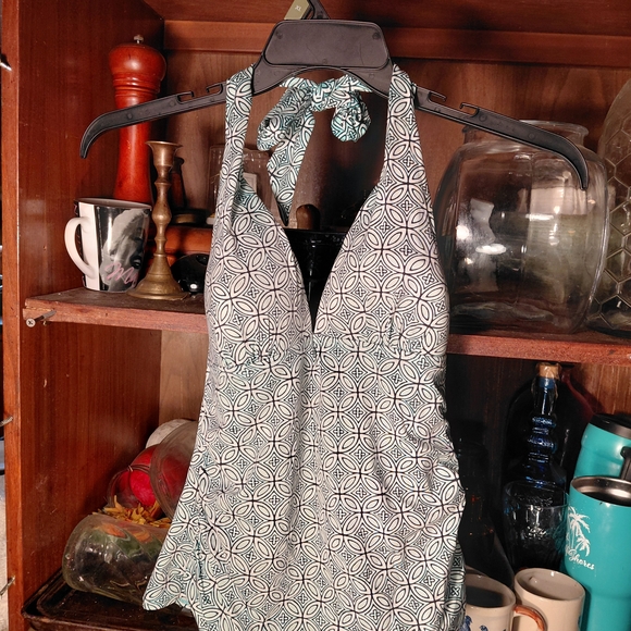 Anna Other - halter-neck one-piece swimsuit with a teal and white geometric pattern